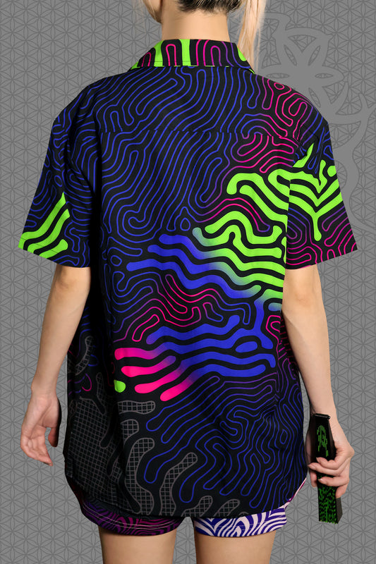 back view psychedelic short sleeve camp shirt with black base and flowing neon reaction diffusion patterns in green, pink, blue, and purple, featuring button front and spread collar