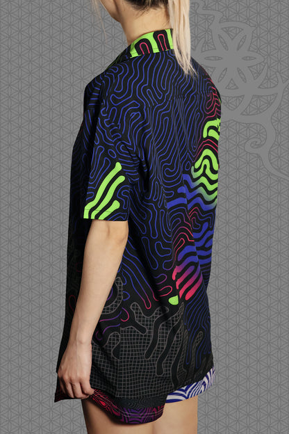 left view psychedelic short sleeve camp shirt with black base and flowing neon reaction diffusion patterns in green, pink, blue, and purple, featuring button front and spread collar