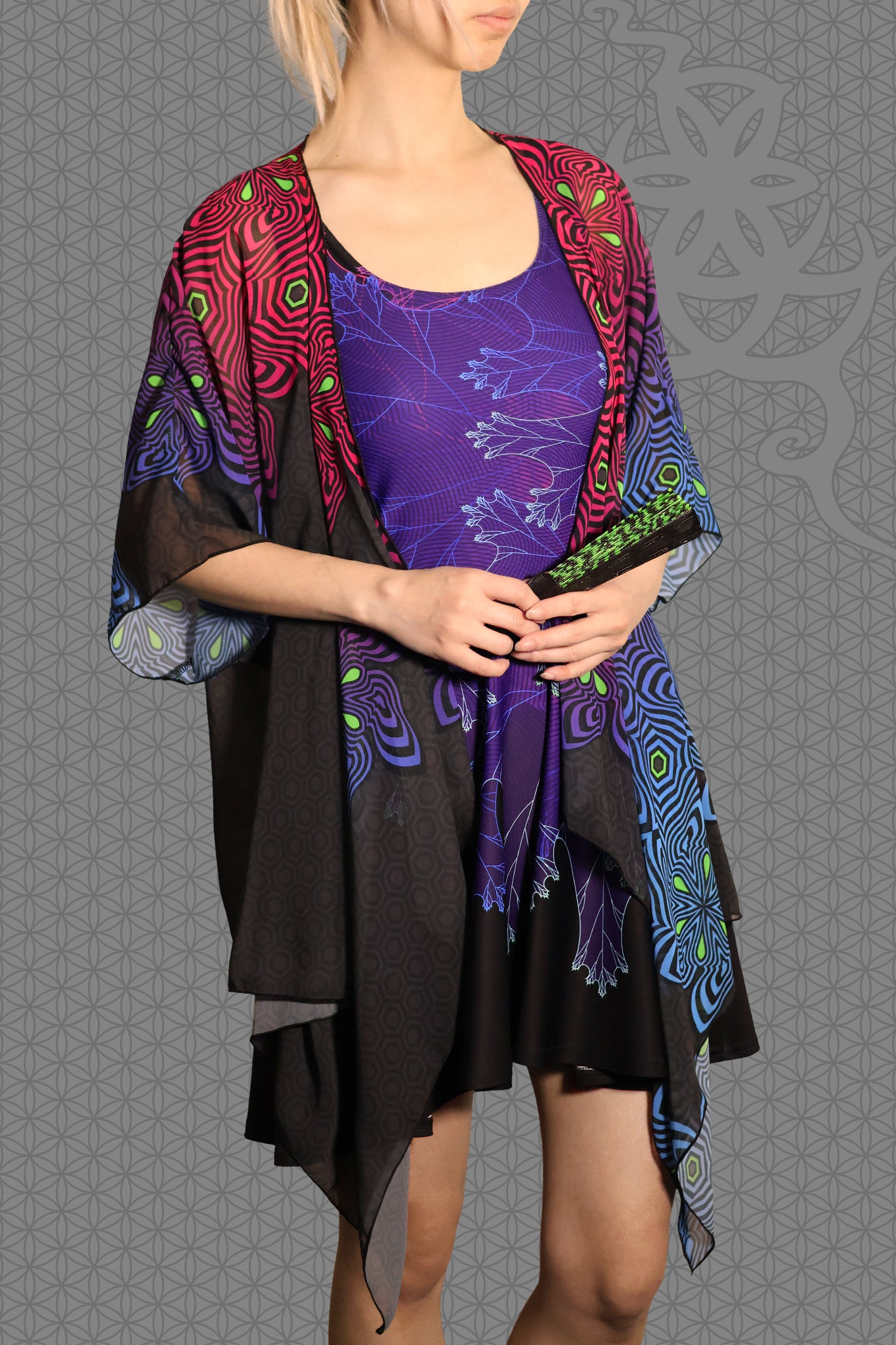 model view psychedelic rave skater dress with purple fractal botanical patterns and black gradient skirt