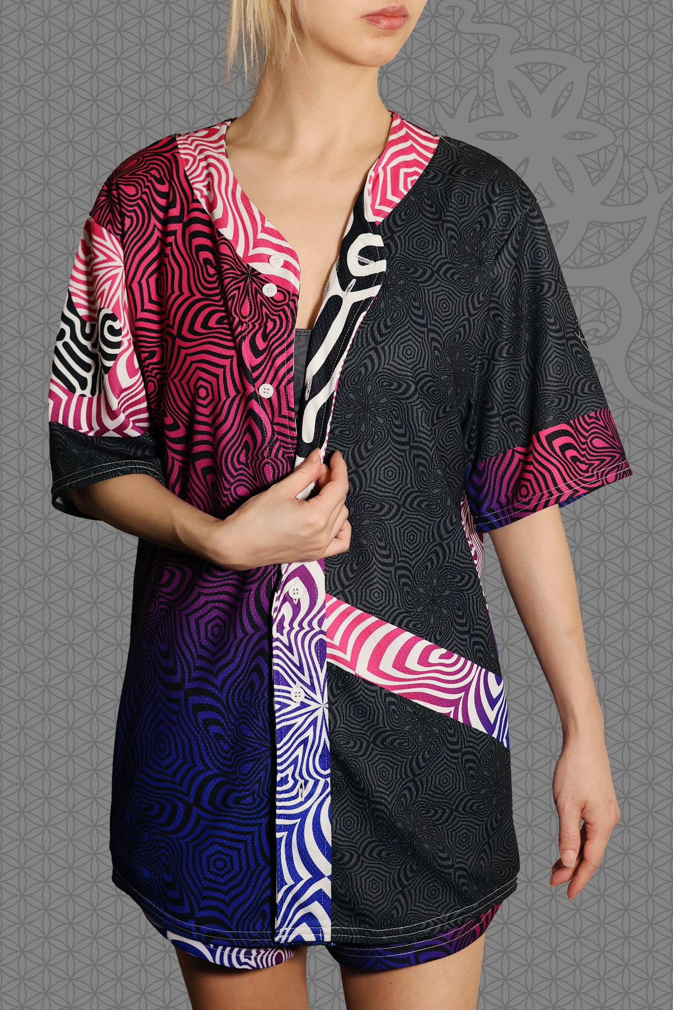 front view psychedelic rave baseball jersey with neon pink, purple, and blue geometric optical patterns and gradient panels