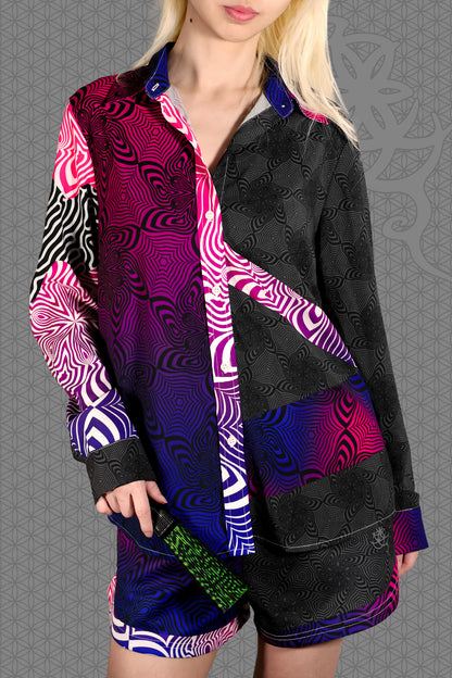 front view psychedelic rave women button up shirt with neon pink, purple, and blue geometric optical patterns and gradient panels