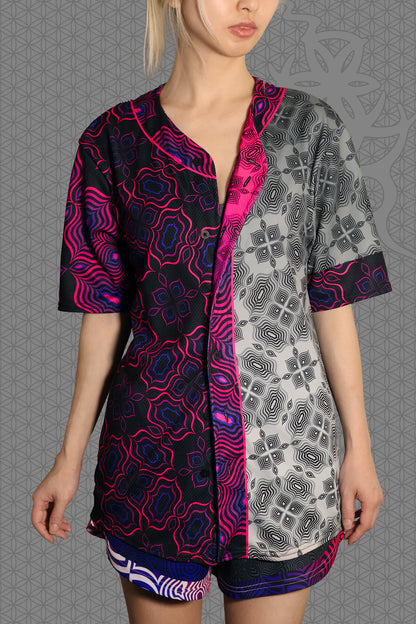 front view psychedelic rave baseball jersey with black and neon pink geometric optical patterns and contrasting gray psychedelic pattern panels

