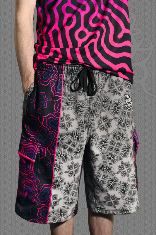 front view psychedelic cargo shorts with split design featuring grey geometric pattern on one side and vibrant pink-purple pattern on the other, with drawstring waist and side cargo pockets