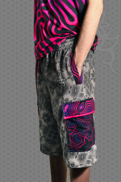 left view psychedelic cargo shorts with split design featuring grey geometric pattern on one side and vibrant pink-purple pattern on the other, with drawstring waist and side cargo pockets