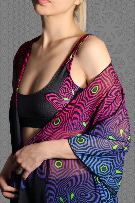 close-up view sheer chiffon psychedelic rave kimono with neon pink, purple, blue, and green geometric optical patterns on black
