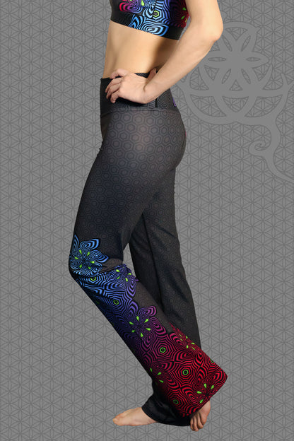 left lay-flat view psychedelic rave flare leggings with neon pink, purple, blue, and green flower patterns on black