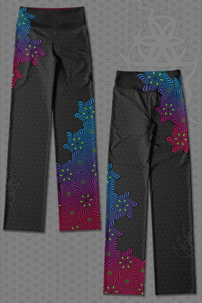 lay-flat view psychedelic rave flare leggings with neon pink, purple, blue, and green flower patterns on black